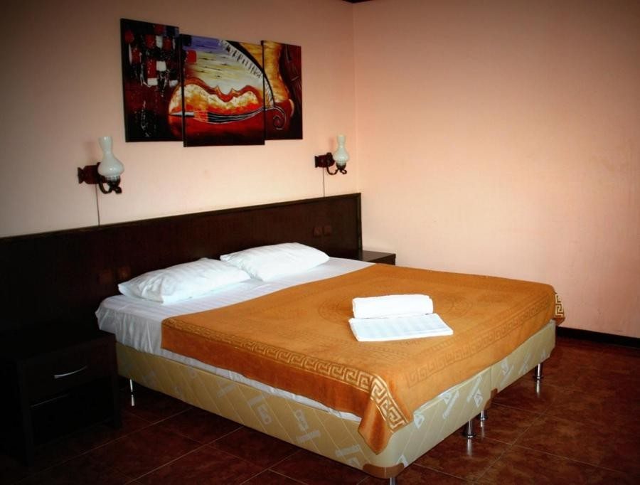 Двухместный (Большой двухместный номер с 1 кроватью или 2 отдельными кроватями) отеля Капитан, Тамань