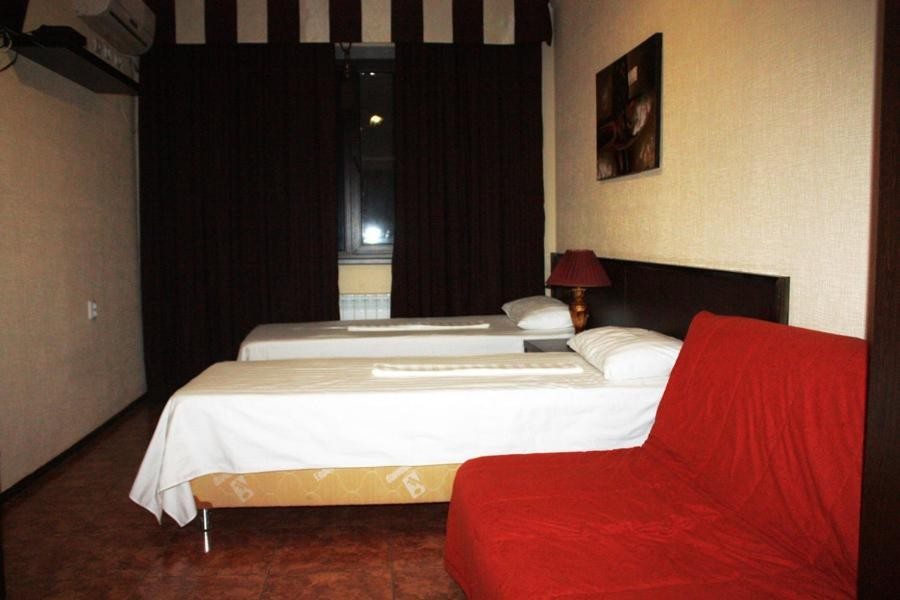 Двухместный (Большой двухместный номер с 1 кроватью или 2 отдельными кроватями) отеля Капитан, Тамань