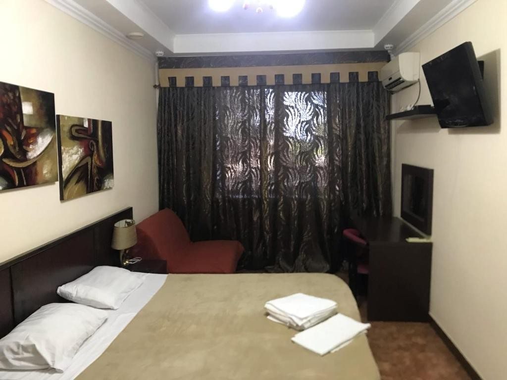 Двухместный (Двухместный номер с 1 кроватью и собственной ванной комнатой вне номера) отеля Капитан, Тамань
