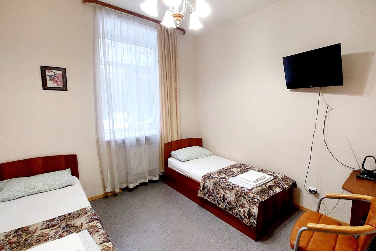 Апартаменты (Двухкомнатные с 4 односпальными кроватями) отеля Логос Санкт-Петербург