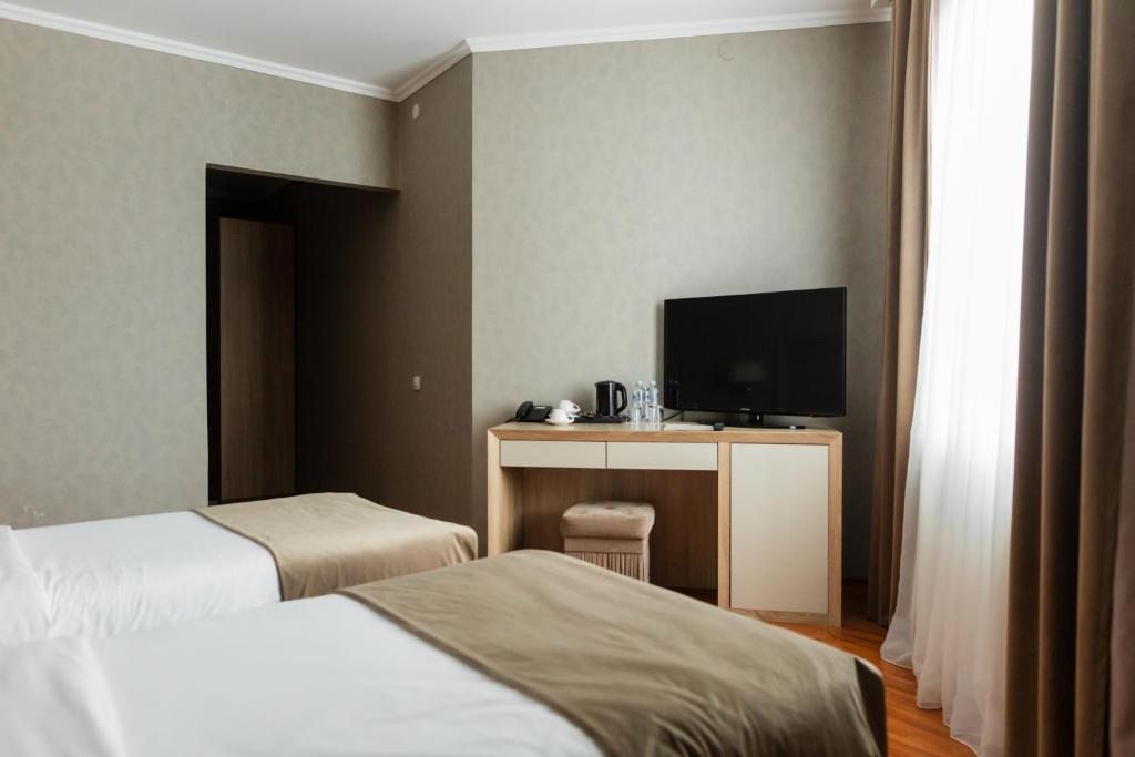 Двухместный (Улучшенный номер с 2 раздельными кроватями) гостиницы Bellagio, Курск