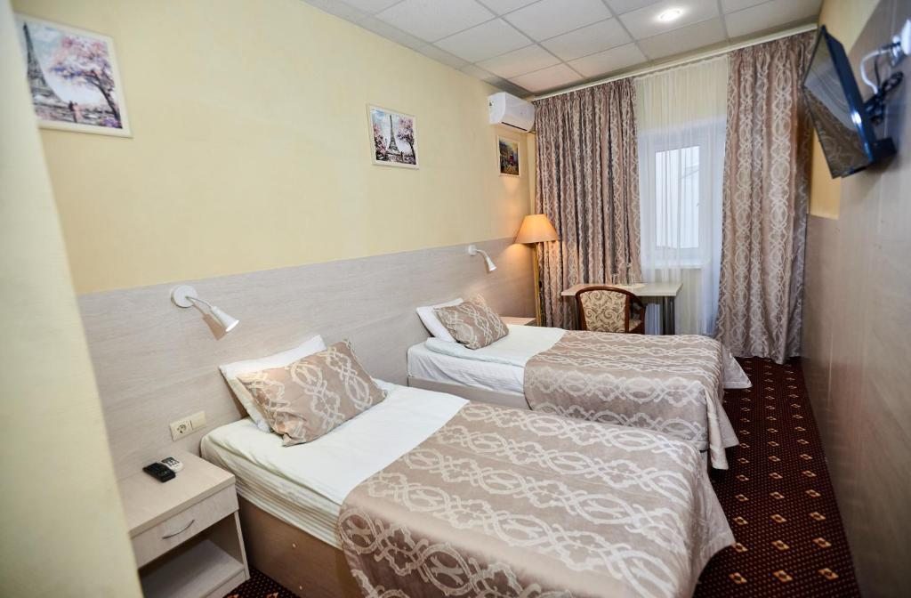 Двухместный (Двухместный номер эконом-класса с 2 отдельными кроватями и террасой) отеля Арбат, Балаково