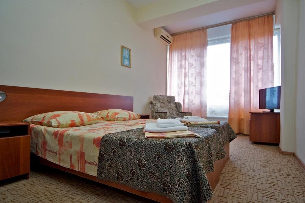 Двухместный (Стандартный двухместный номер с 2 отдельными кроватями и видом на море) курортного отеля Эдем, Сочи