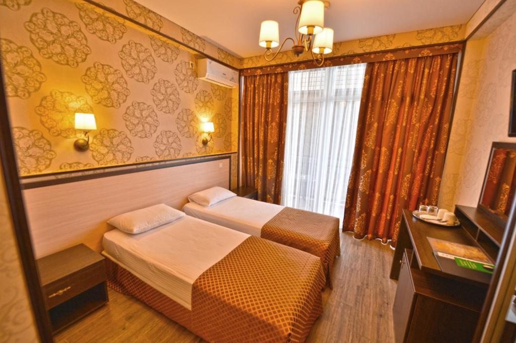 Двухместный (Двухместный номер с 2 отдельными кроватями) семейного отеля Амвель, Лазаревское