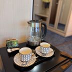 В каждом номере чайная станция