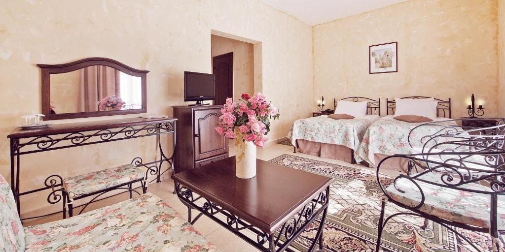 Двухместный (Улучшенный двухместный номер с 1 кроватью или 2 отдельными кроватями) отеля Alean Family Resort & SPA Riviera 4*, Анапа