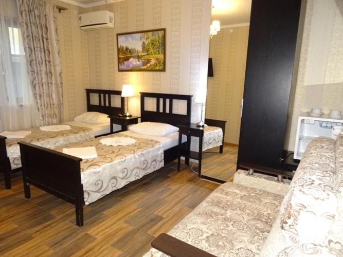 Двухместный (Стандартный двухместный номер с 2 отдельными кроватями) отеля Медовый, Гагра
