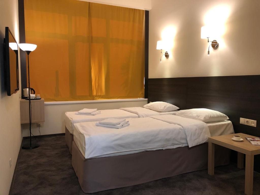 Двухместный (Стандартный двухместный номер с 2 отдельными кроватями) отеля Континент Гагра