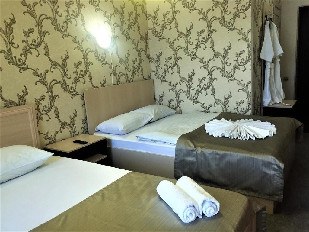 Двухместный (Просторный двухместный номер с 2 отдельными кроватями) гостиницы Art Plaza, Томск