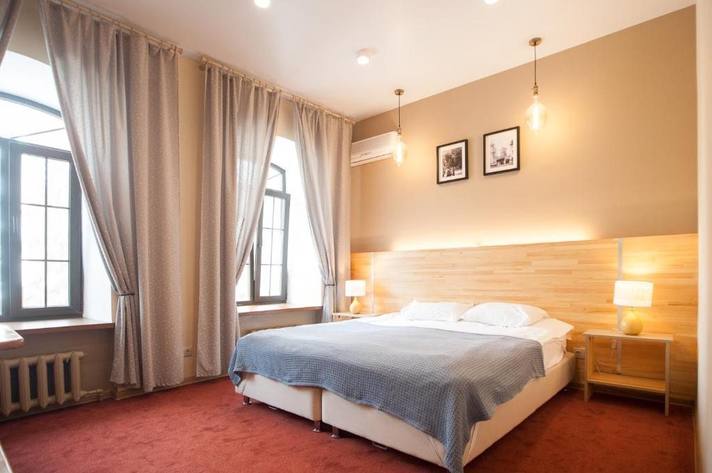 Двухместный (Улучшенный двухместный номер с 1 кроватью или 2 отдельными кроватями (№1)) гостиницы На Каминского, Тула