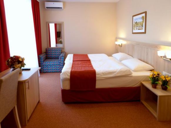 Фотография номера гостиницы Вишневый сад